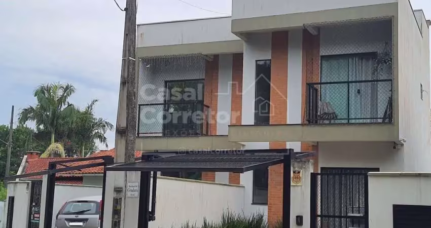 Casa sobrado no bairro santa terezinha com 72,50m², duas suítes, duas vagas de garagem e espaço nos fundos