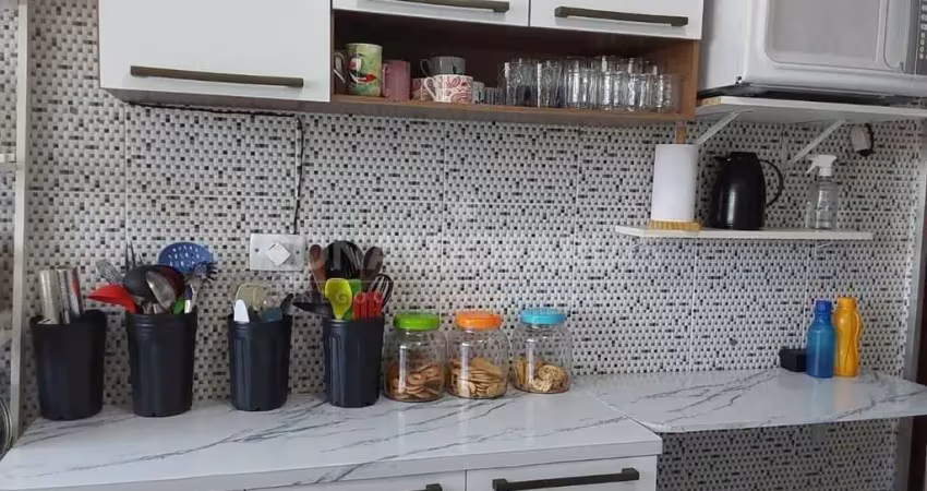 Apartamento a venda sendo dois quartos , sala dois amientes , 1 vaga de garagem.