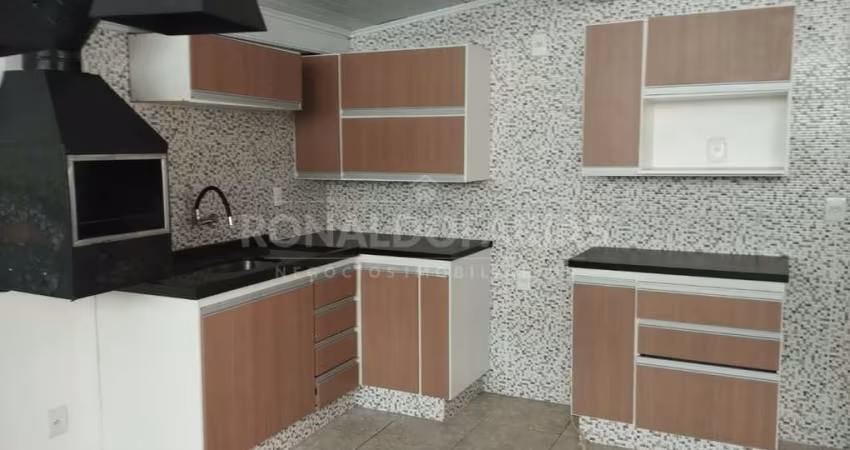 Casa terrea  a venda  sendo 3 quartos , 4 vagas de garagem , quintal .