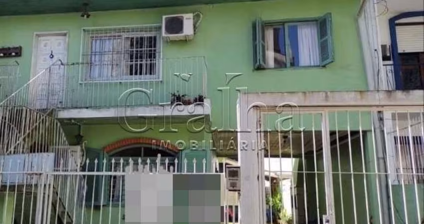 Casa com 4 quartos à venda na Avenida Montenegro, 215, Petrópolis, Porto Alegre
