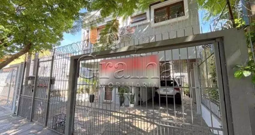 Casa com 4 quartos à venda na Rua Coronel Jaime da Costa Pereira, 376, Partenon, Porto Alegre