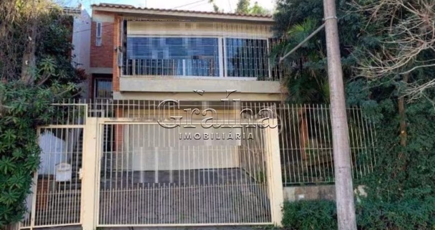 Casa com 4 quartos à venda na Rua Antônio Ribeiro, 321, Santo Antônio, Porto Alegre