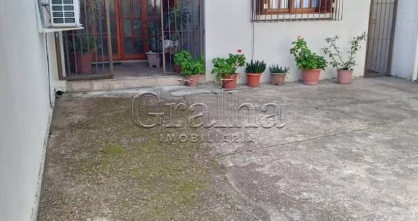 Casa com 3 quartos à venda na Rua Honório Lemos, 354, Partenon, Porto Alegre