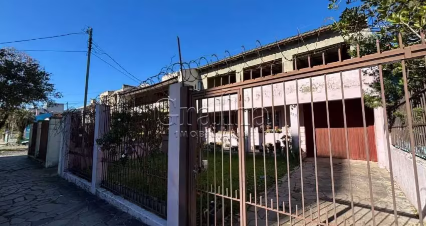 Casa com 3 quartos à venda na Rua Monteiro Lobato, 323, Partenon, Porto Alegre