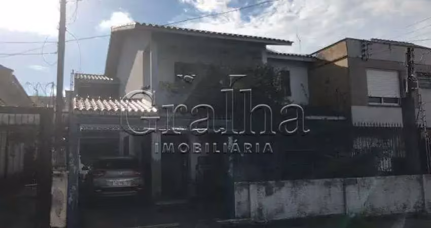 Casa com 5 quartos à venda na Rua Coronel Jaime da Costa Pereira, 318, Partenon, Porto Alegre