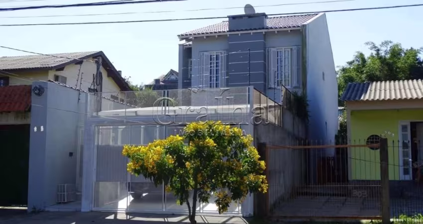 Casa em condomínio fechado com 5 quartos à venda na Rua Banco Inglês, 307, Santa Tereza, Porto Alegre
