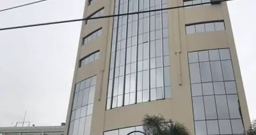 Sala comercial com 35m² de área útil. possui 2 banheiros, 1 vaga.