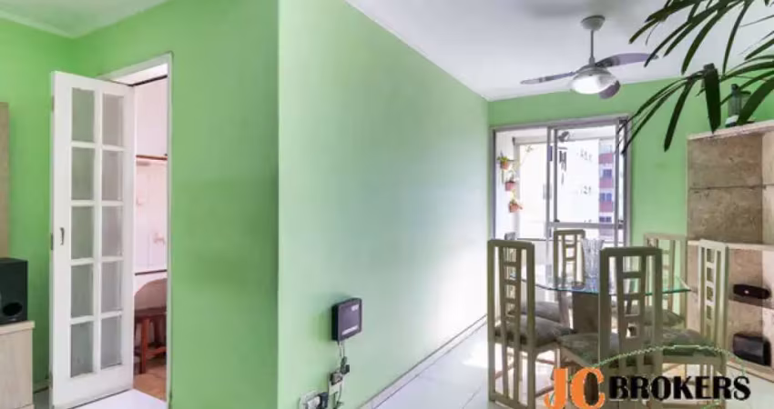 Apartamento com 60 m², 2 dormitórios com armário embutido, sala para 2 ambientes, 1 vaga