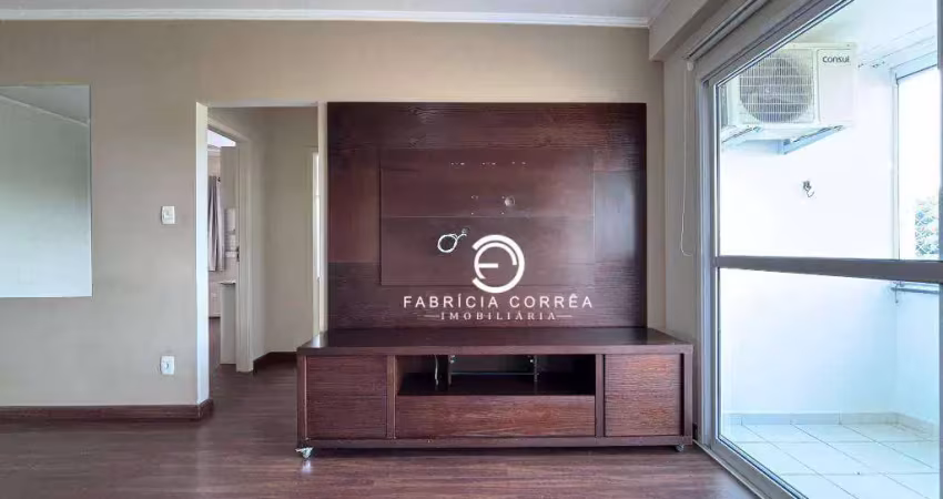 Apartamento com planejados, ar-condicionado e sala ampla em dois ambientes