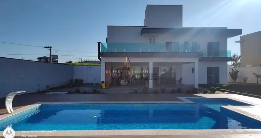 Sobrado com 4 dormitórios à venda, 462 m² por r$ 2.200.000,00 - condomínio village da serra - tremembé/sp