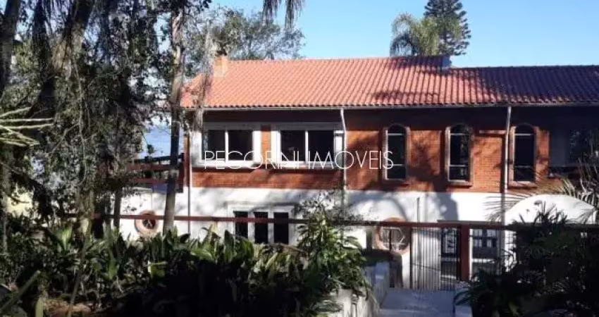 Casa com 4 quartos à venda na Rua Acácias, 405, Ponta Grossa, Porto Alegre