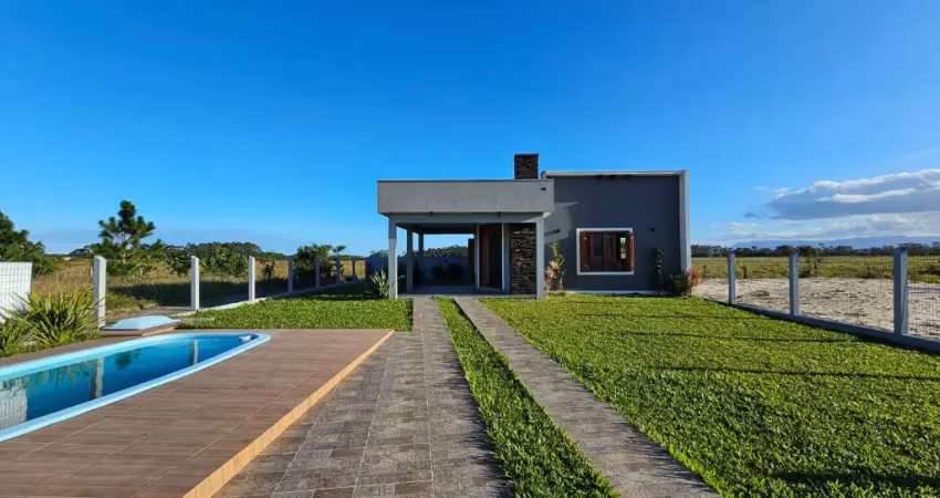 Casa com piscina próxima ao centro