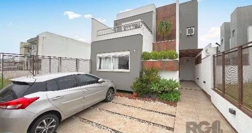 Casa em Porto Alegre, no bairro Hípica, com 3 dormitório(s), e 3 banheiros, à venda.