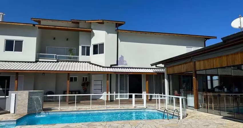Casa em condomínio fechado com 5 quartos para alugar no Village da Serra, Tremembé 