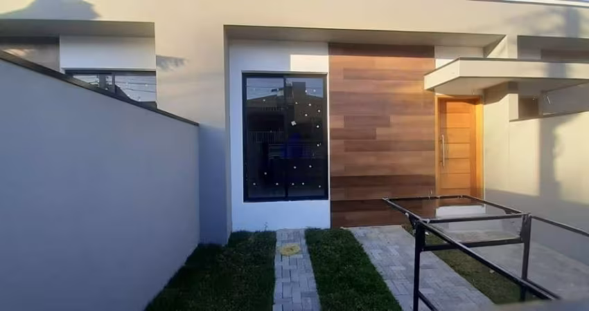 Casa venda com três quartos uma suíte e quintal amplo.