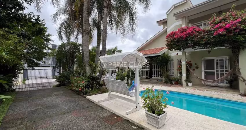 Casa com 5 quartos à venda na Rua País de Gales, 41, Moinhos De Vento, Canoas