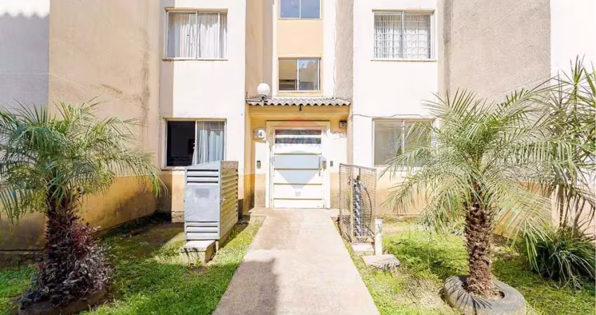 Apartamento térreo com 42m2, 2 quartos, 1 vaga de garagem a venda no ganchinho.