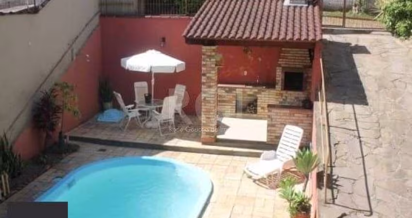 Casa 3 dormitórios à venda Parque Santa Fé Porto Alegre/RS