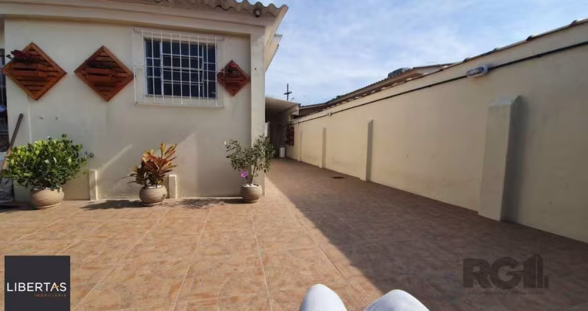 Casa 3 dormitórios à venda Guarujá Porto Alegre/RS