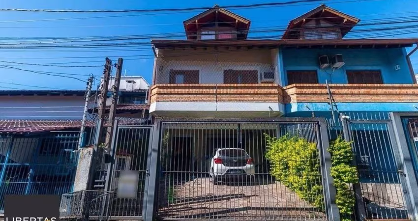 Casa 5 dormitórios no bairro Ipanema