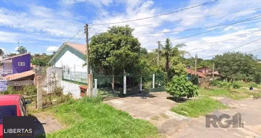 Casa com 3 quartos à venda na Rua Ênio de Souza, 226, Vila Nova, Porto Alegre