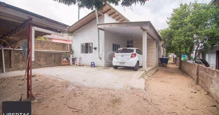 Casa com 3 dormitórios, 2 suítes, amplo pátio e 2 vagas de garagem na Zona Norte
