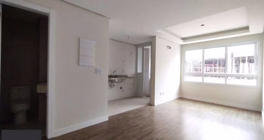 APARTAMENTO 1 DORMITÓRIO COM SUÍTE, COZINHA AMERICANA, LAVABO E AMPLO LIVING NO