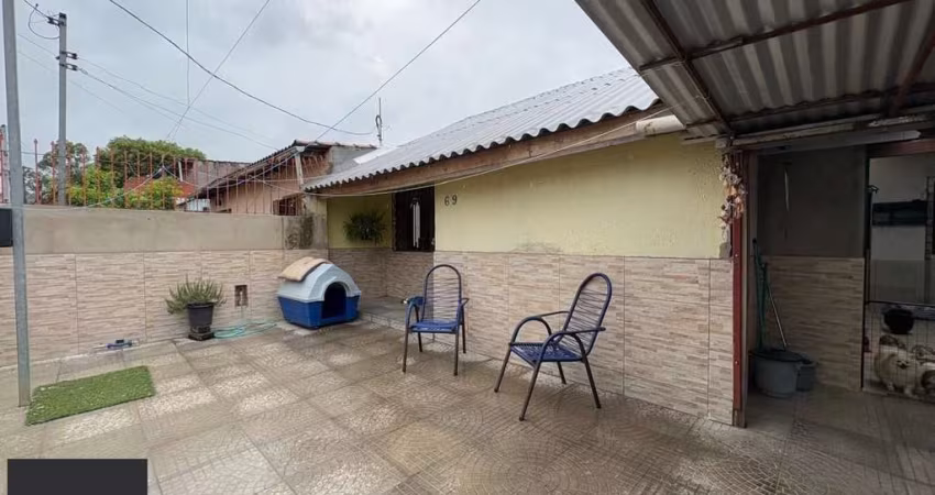 Casa no bairro Restinga - 3 dormitórios