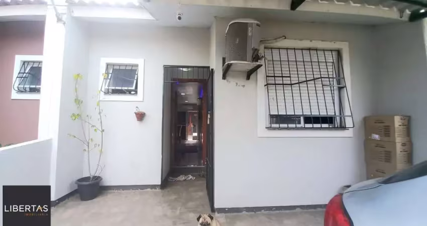 Casa com 2 quartos à venda na Rua Milton dos Santos Martins, 41, Restinga, Porto Alegre