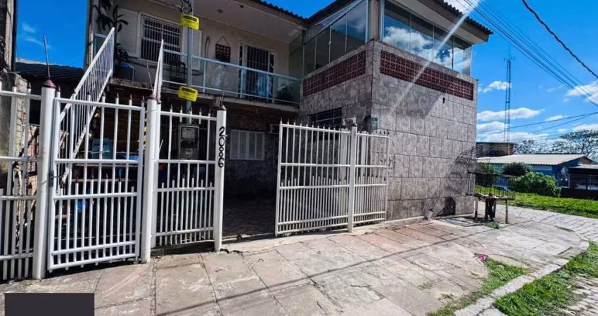 Casa no bairro Restinga - 3 dormitórios