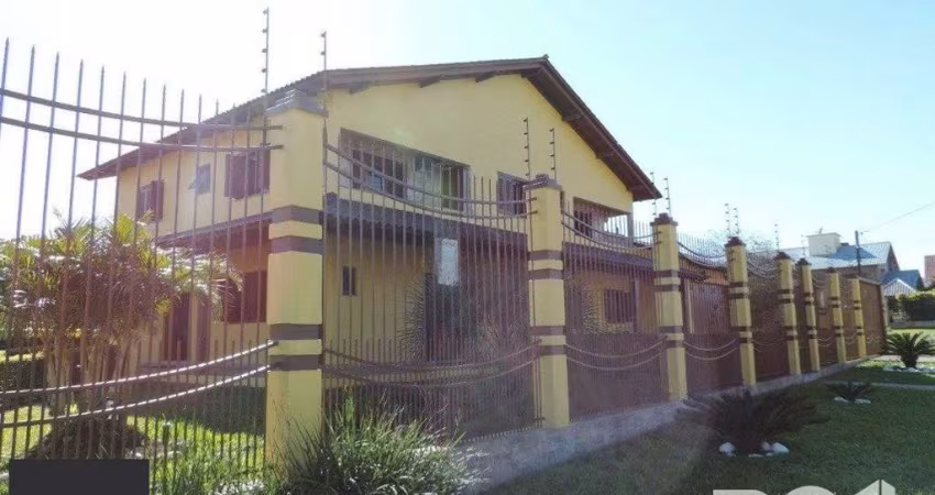 Casa 4 dormitórios à venda Parque Santa Fé Porto Alegre/RS