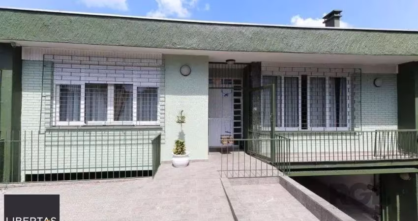 Casa com 5 quartos à venda na Rua Campos Elíseos, 291, Glória, Porto Alegre