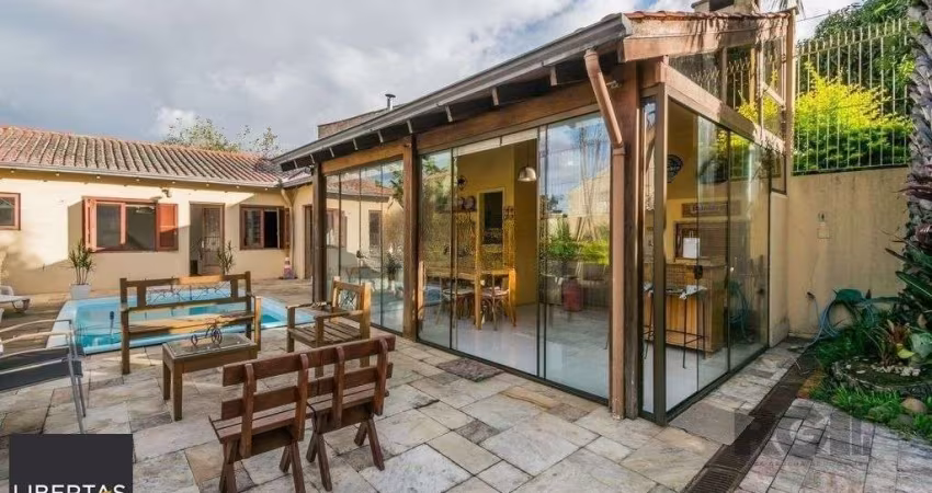 Casa 279m² - 4 dormitórios, 3 vagas no bairro Santa Tereza