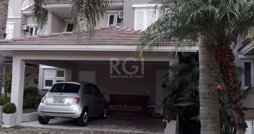 Casa em condomínio fechado, às margens do rio guaíba,