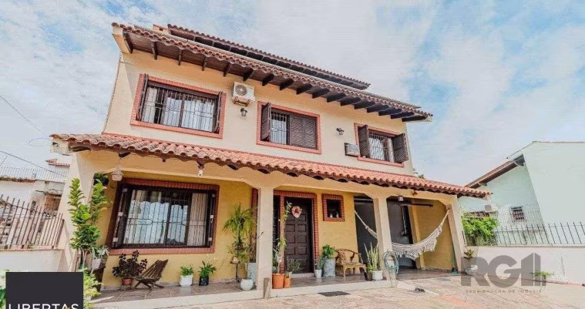 Casa com 234m², 3 dormitórios, 3 vagas no bairro Partenon
