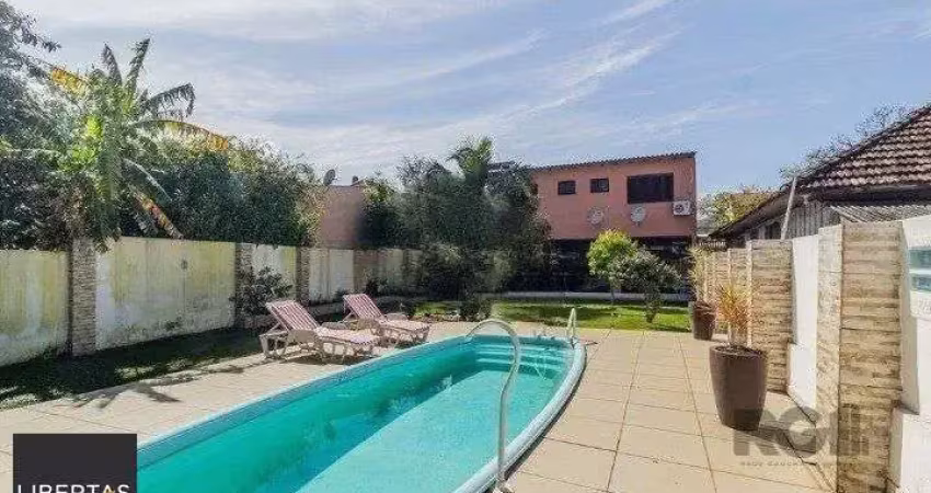 Casa com 3 quartos à venda na Rua Humberto de Campos, 1267, Partenon, Porto Alegre
