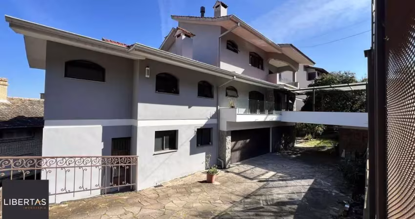 Casa com 4 quartos à venda na Rua Professor Xavier Simões, 467, Tristeza, Porto Alegre