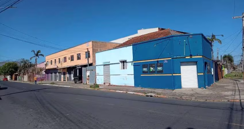 Terreno de esquina com 2  predios comerciais necessitando reforma.