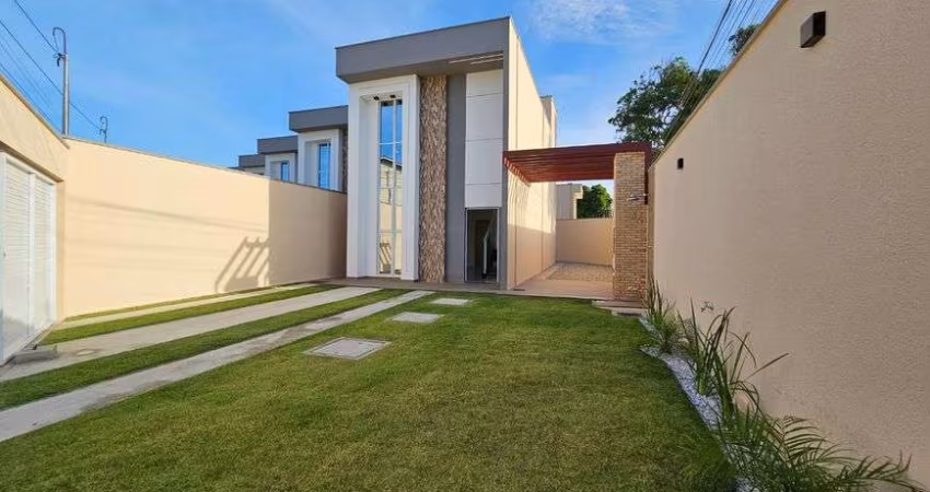 Casa para venda possui 3 suítes, 3 vagas de garagem no Eusébio - Ceará