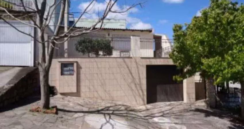 Casa com 4 quartos à venda na Rua Tijuca, Medianeira, Porto Alegre