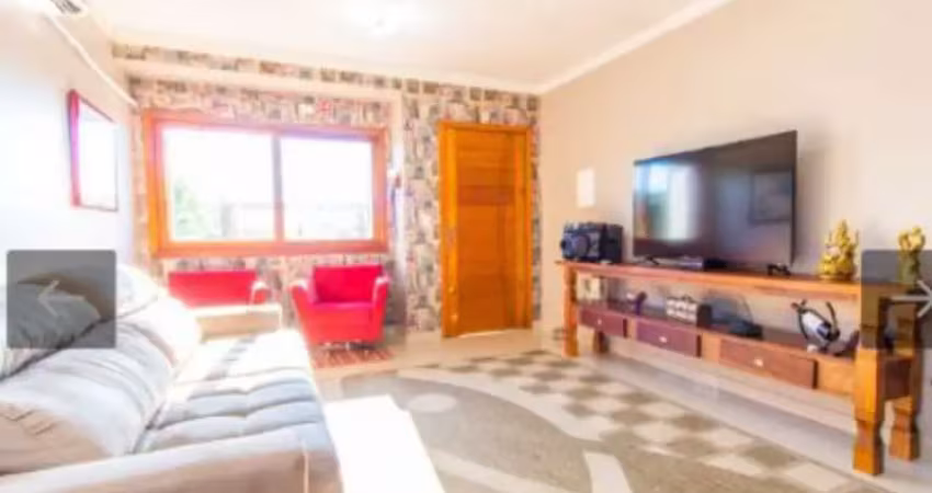 Casa com 3 quartos à venda na Rua Waldemar da Silva Tavares, Guarujá, Porto Alegre