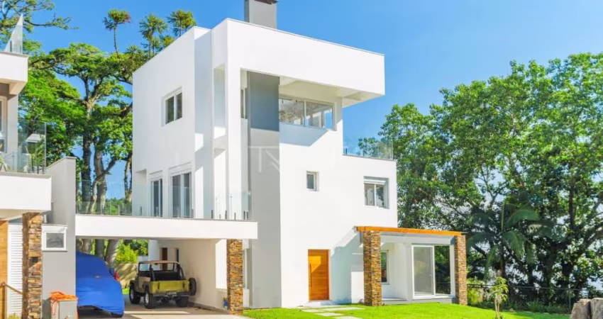 Casa em condomínio fechado com 3 quartos à venda na Avenida Coronel Marcos, 1239, Pedra Redonda, Porto Alegre