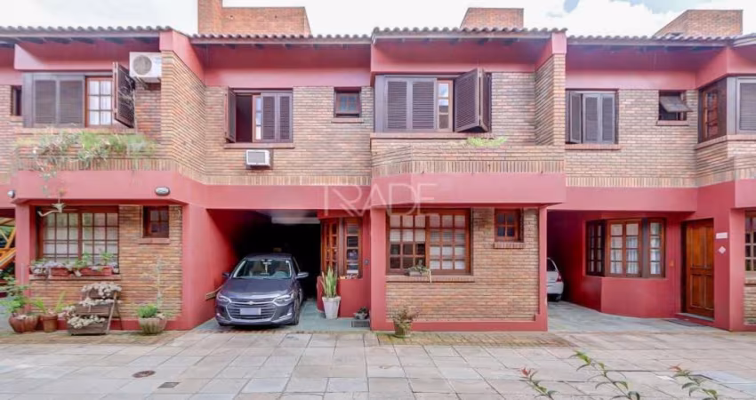 Casa em condomínio fechado com 3 quartos à venda na Avenida Coronel Marcos, 1608, Pedra Redonda, Porto Alegre