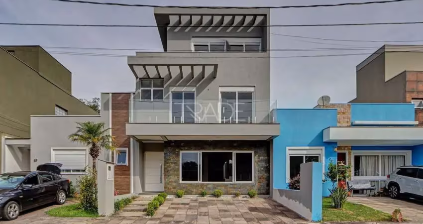 Casa em condomínio fechado com 3 quartos à venda na Rua Eroni Soares Machado, 300, Hípica, Porto Alegre