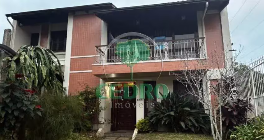 Casa com 4 quartos à venda na Rua Upamaroti, 836, Cristal, Porto Alegre
