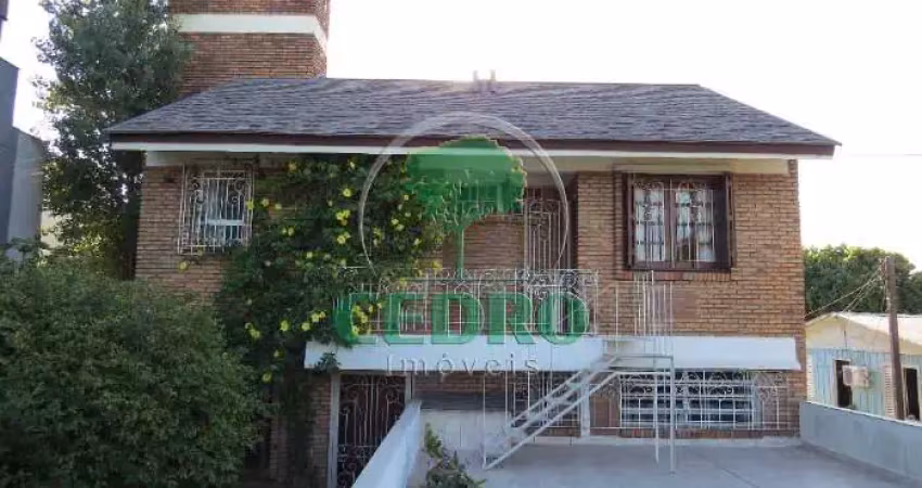 Casa com 3 quartos à venda na Rua Delfino Riet, 287, Santo Antônio, Porto Alegre