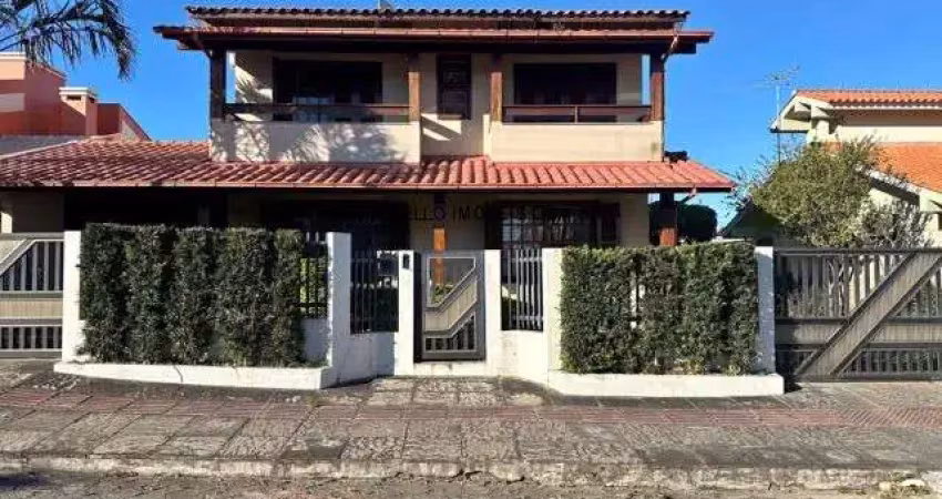Imóvel espaçoso e moderno à venda no centro de garopaba-sc: 4 quartos, 1 suíte e 6 vagas de garagem!