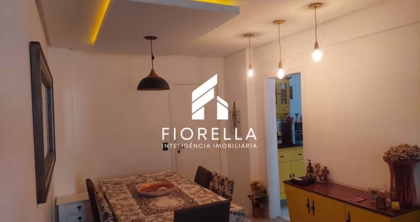Apartamento à venda com  03 dormitórios, sendo 01 suíte no Centro em Palhoça-SC.