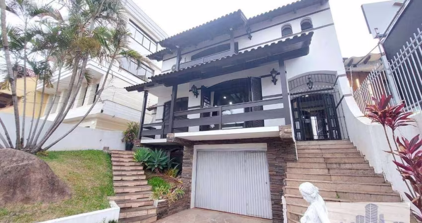 Casa com 5 dormitórios para alugar, 382 m² por R$ 7.000,00/mês - Tristeza - Porto Alegre/RS