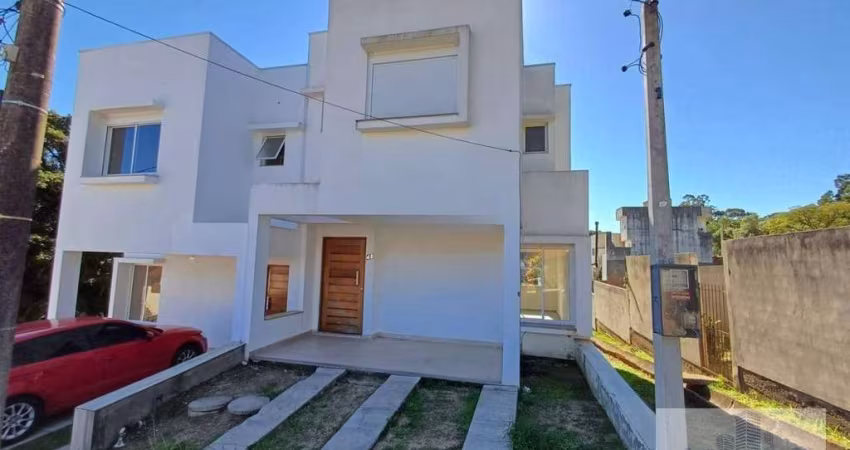 Casa com 3 dormitórios para alugar, 168 m² por R$ 2.260/mês - Campo Novo - Porto Alegre/RS